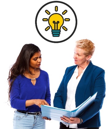 2 women are looking at a folder together and talking. Above them is a lightbulb.