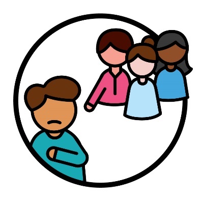 An Autistic person who looks sad and is separated from a group of 3 other people.