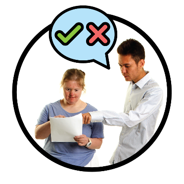 Someone supporting a person to read a document. There is a speech bubble between them with a tick and a cross inside of it.