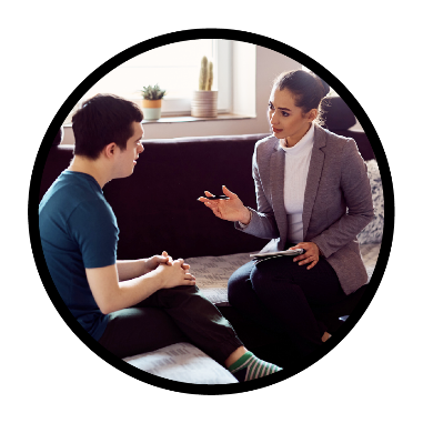 A young person having a conversation with a therapist.