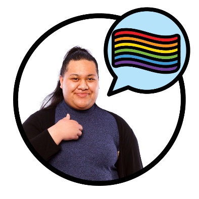 A person pointing to themself. They have a speech bubble showing a rainbow flag.