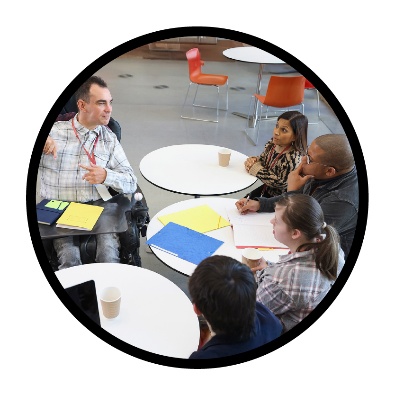 A group of people having a meeting.