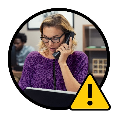 An NDIA worker on the phone. A problem icon is below them.