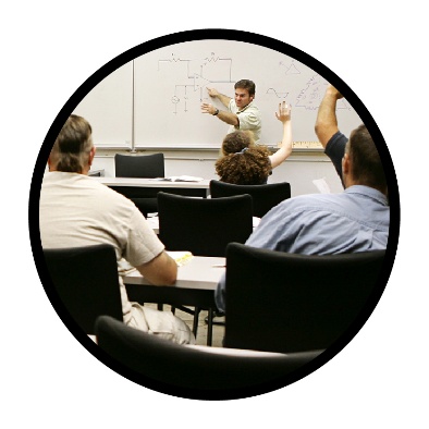 A person teaching a group of people.