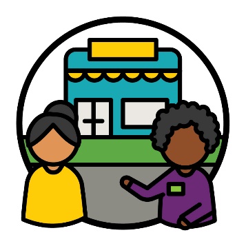 A person having a conversation with an NDIA worker in front of a shop.