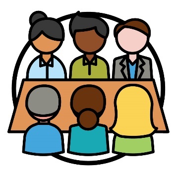 A group of people in a meeting.
