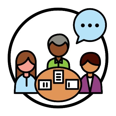 3 people around a table. Above one person is a speech bubble.