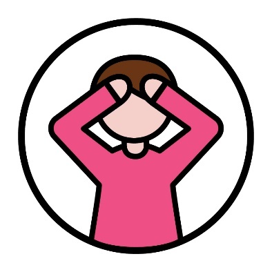 A person with their hands on their head worried.