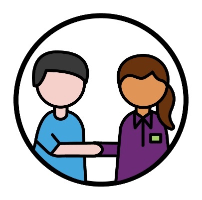 An NDIA worker shaking hands with someone.