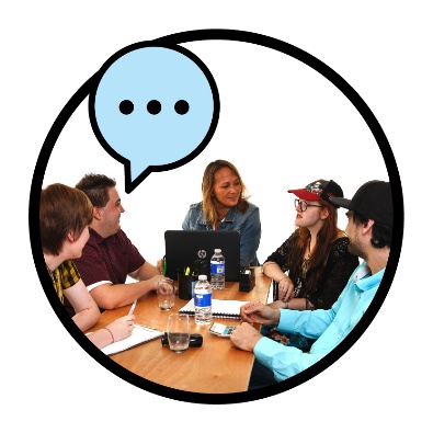 A group of people in a meeting. Above them is a speech bubble.