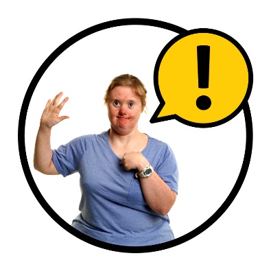 A person with disability pointing to themself. Above them is an exclamation mark inside a speech bubble.