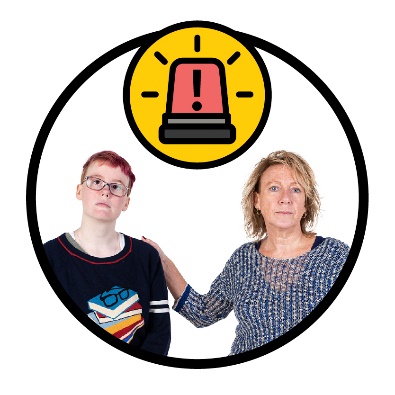 A person supporting someone. Above them is an emergency alarm. 