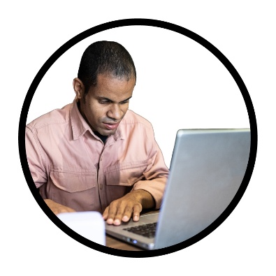 A person using a laptop.