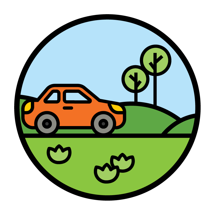 A car driving down a road with trees and grassland around it.
