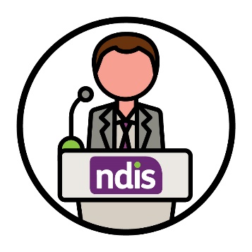 A minister behind a podium with a microphone. The NDIS logo is on the front of the podium.