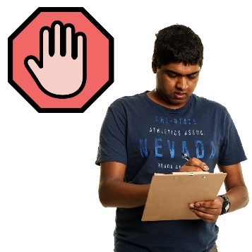 A person writing on a clipboard with a stop sign above them.