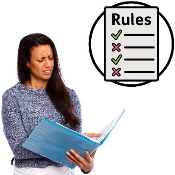 A provider reading a document. Next to them is a rules document.