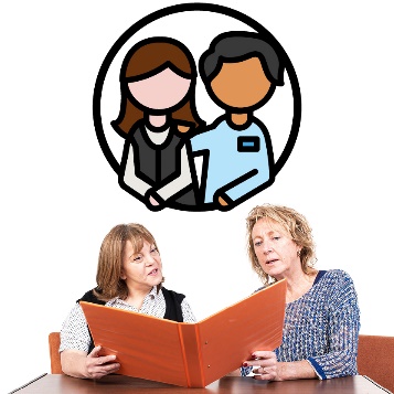 Someone looking at a document with a participant. Above them is a support worker supporting the participant.
