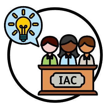 3 people behind a bench that says 'IAC'. Above them is a lightbulb inside of a speech bubble.