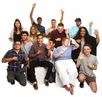 A group of people, some with their hands raised. 