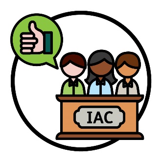 3 IAC Members behind a bench that says 'IAC'. Above them is a thumbs up inside of a speech bubble.