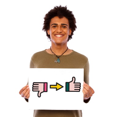 A person holding a piece of paper with a thumbs down becoming a thumbs up on it. 