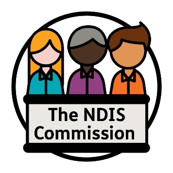 Three people standing behind a panel saying N D I S Commission. 