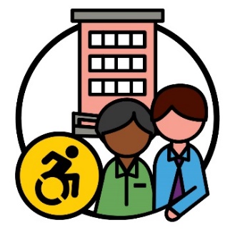 Two people standing in front of a building, with a disability icon next to them. 
