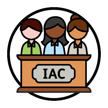 Three people standing behind a lectern with the badge IAC