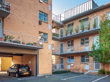 A triple-storey apartment building. 