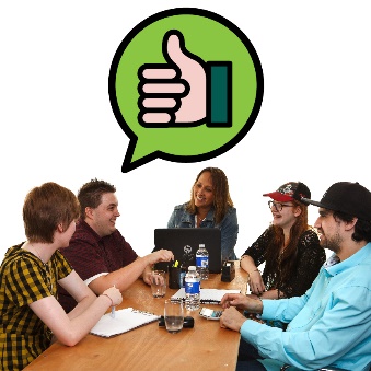 A group of people having a meeting. Above them is a speech bubble that shows a thumbs up.