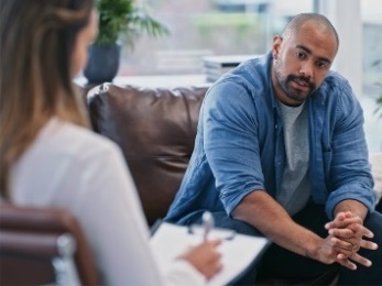 A person getting help from a counsellor.