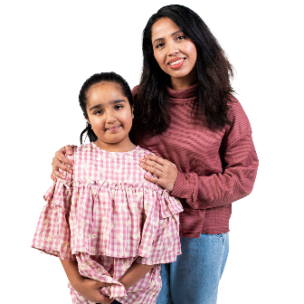 An adult supporting a child. They are both smiling.