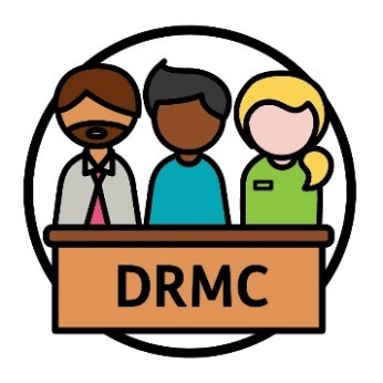 3 people behind a bench that says 'DRMC'.