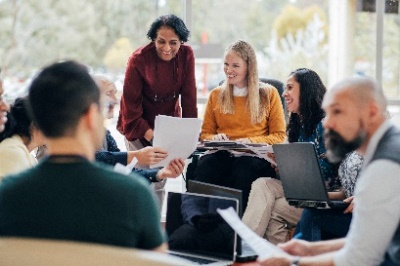 A group of people having a meeting.