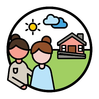 Two people standing in front of a house