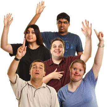 A group of people each with their hand in the air.