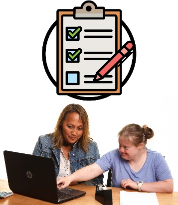 A goals document and a participant showing someone something on a laptop.