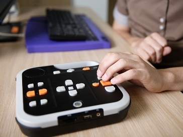 A participant using assistive technology.
